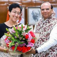 Delhi Lieutenant Governor VK Saxena and CM Atishi/File image