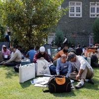 Polling officials inspect the election material in Srinagar. Sharafat Ali/Reuters