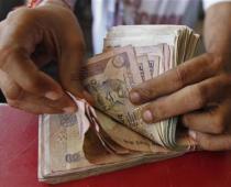 Rupee Rises 7 Paise to 84.22 Against US