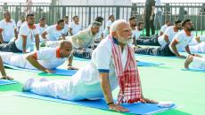 Twist and bend: Modi performs yoga from Vizag beach