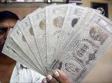 Rupee Rises 4...