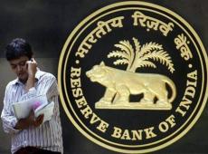 RBI Holds Rates,...