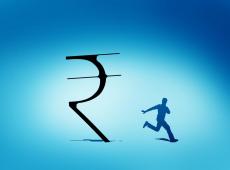 Rupee Surges to...