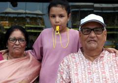 PIX: Dhoni's parents at a stadium for first time!