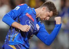 IPL PIX: Santner, SKY power MI into play-offs