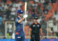IPL PIX: Marsh's century spoils Titans' top-two hopes