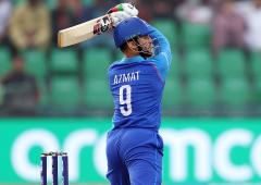 Omarzai stars as Afghanistan beat UAE to keep hopes alive