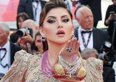 Urvashi Flaunts Bikini Shaped Clutch
