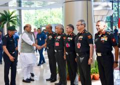 Who Is Rajnath Shaking Hands With?