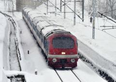 A Train Chugs Along In The Kashmir Snow
