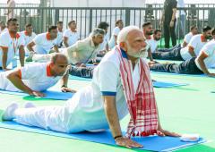 Twist and bend: Modi performs yoga from Vizag beach
