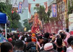 Mumbai bids farewell to Bappa amid rain, bomb threat