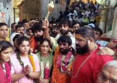Protesting wrestlers march to Hanuman temple