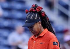 Crystal-studded Osaka outshines Minnen in opener