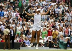 PIX: Swiatek, Bencic enter first Wimbledon semi-final