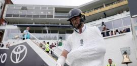 PIX: Hand in Sling, Brave Woakes Walks Out to Bat