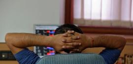 Stock markets end lower amid profit-taking in banking, auto shares