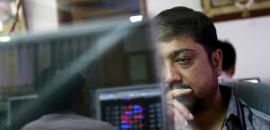 Sensex, Nifty end in red in volatile trade
