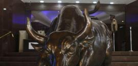 Sensex closes higher 410 pts in volatile trade