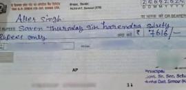Teacher suspended after picture of cheque with spelling errors goes viral
