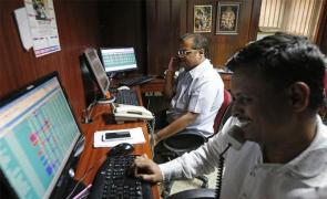 Sensex jumps nearly 450 pts on buying in metal shares