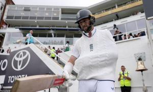 PIX: Hand in Sling, Brave Woakes Walks Out to Bat 