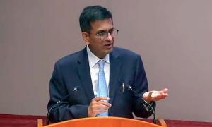 Former CJI Chandrachud denies reports of...