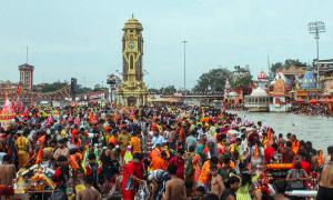 Collecting Water From The Ganga
