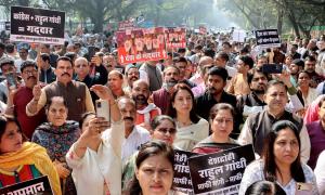 Cong's shirtless stir: BJP protests, waves black flags at Rahul