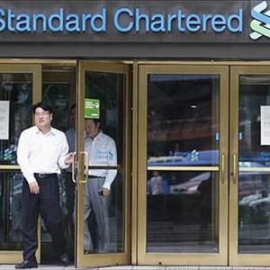 StanChart shakeup turns screws on India's tycoons