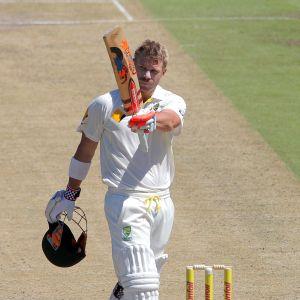 Warner century puts Australia on top