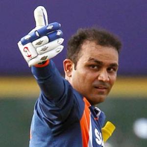 Sehwag's ton helps India storm into final