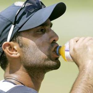 Karthik brought in as cover for injured Sehwag
