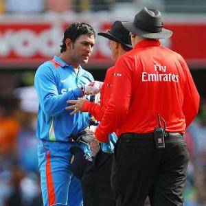 Dhoni gets one-match ban for slow over rate