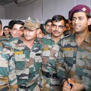 PHOTOS: Lt. Col Dhoni meets Indian army troops in J&K