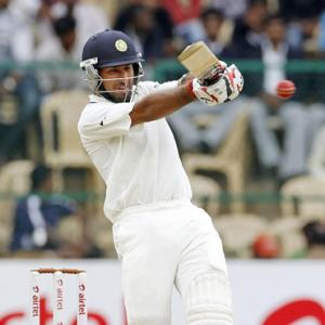 Congratulate Pujara on his maiden double hundred