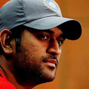 Dhoni comes under attack for conflict of interest