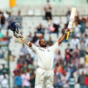 Dhawan scores fastest century on debut, India in control