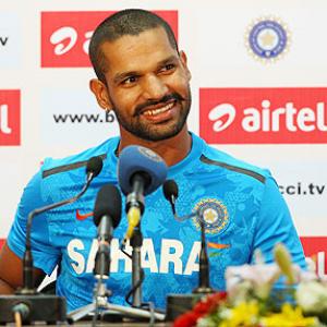 Dhawan takes charge after Smith, Starc rescue act