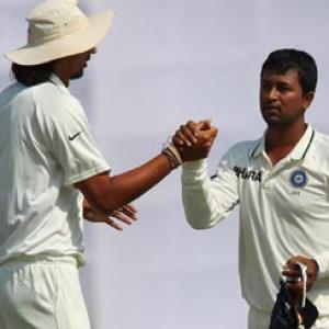 Ojha reaches 100-wicket milestone in Tests