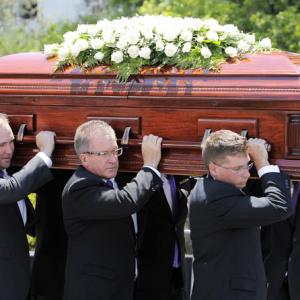Australia's final goodbye to Hughes in hometown funeral