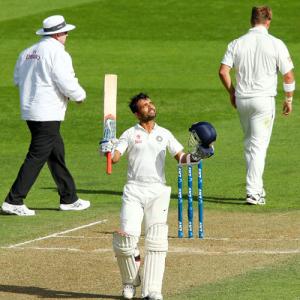 Rahane's maiden Test ton helps India build on their advantage
