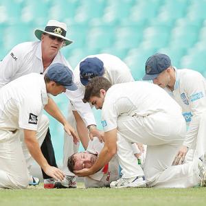 Australia's Hughes to undergo scans after surgery