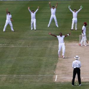 PHOTOS: England restrict timid West Indies