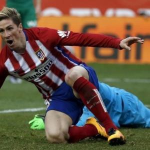 Torres reaches century, Atletico keep pressure on Barca