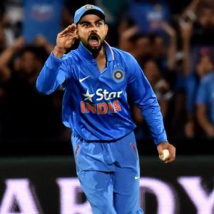 PHOTOS: Kohli, spinners secure India's T20 win against Australia