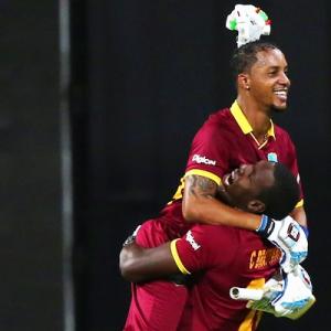 Simmons, Russell lead West Indies to shock win over India