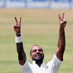 Middle order falters after Dhawan's ton