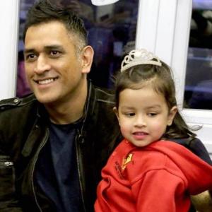 After batting heroics, Dhoni back to daddy duty