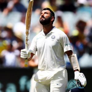 PHOTOS: Pujara hits century as India's batsmen dominate